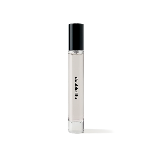 REF Double Life 10ml travel-size eau de parfum bottle, minimalist glass design with black cap.