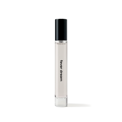 REF Fever Dream 10ml travel-size eau de parfum bottle, minimalist glass design with black cap.